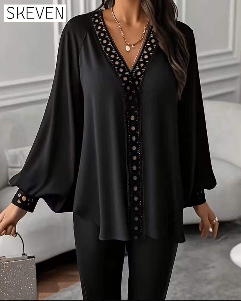 Lockere Bluse mit Laternenärmeln und V-Ausschnitt