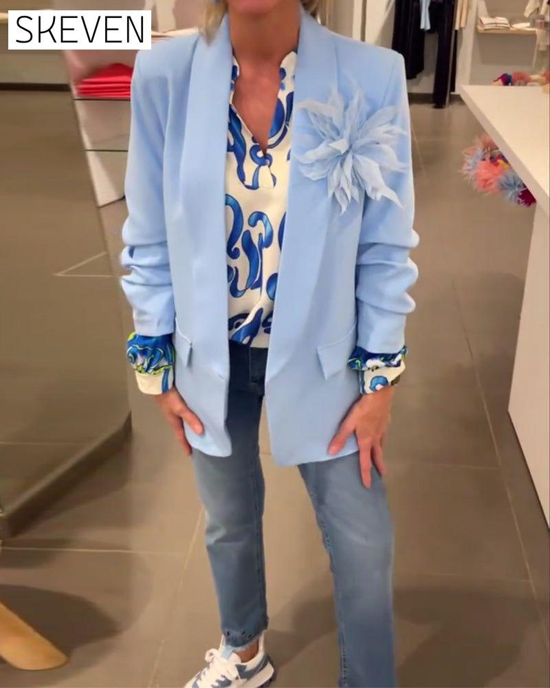Elegant long-sleeved top with printed V-neck