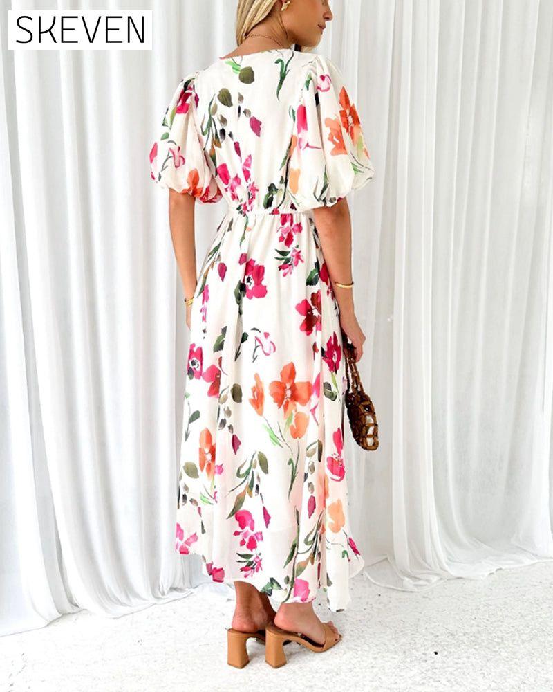 Elegantes Kleid mit Puffärmeln und Blumenmuster
