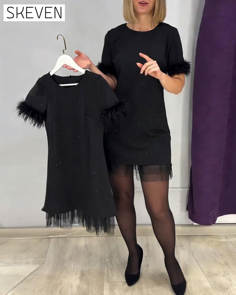 Straußenfeder-Netzkleid mit Strasssteinen