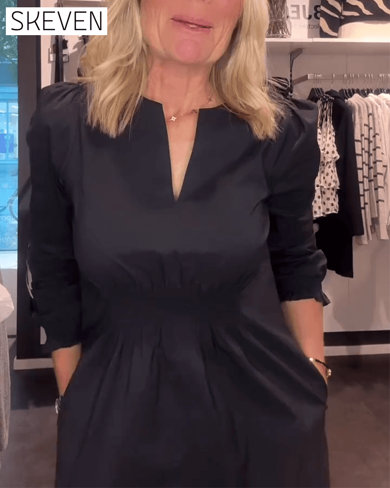 Robe trapèze à manches bouffantes et taille haute