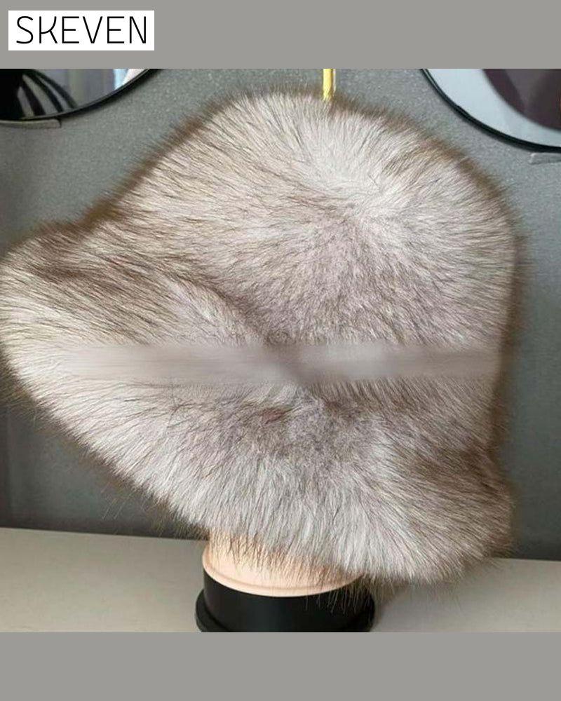 Bequeme und elegante Wintermütze mit Fell