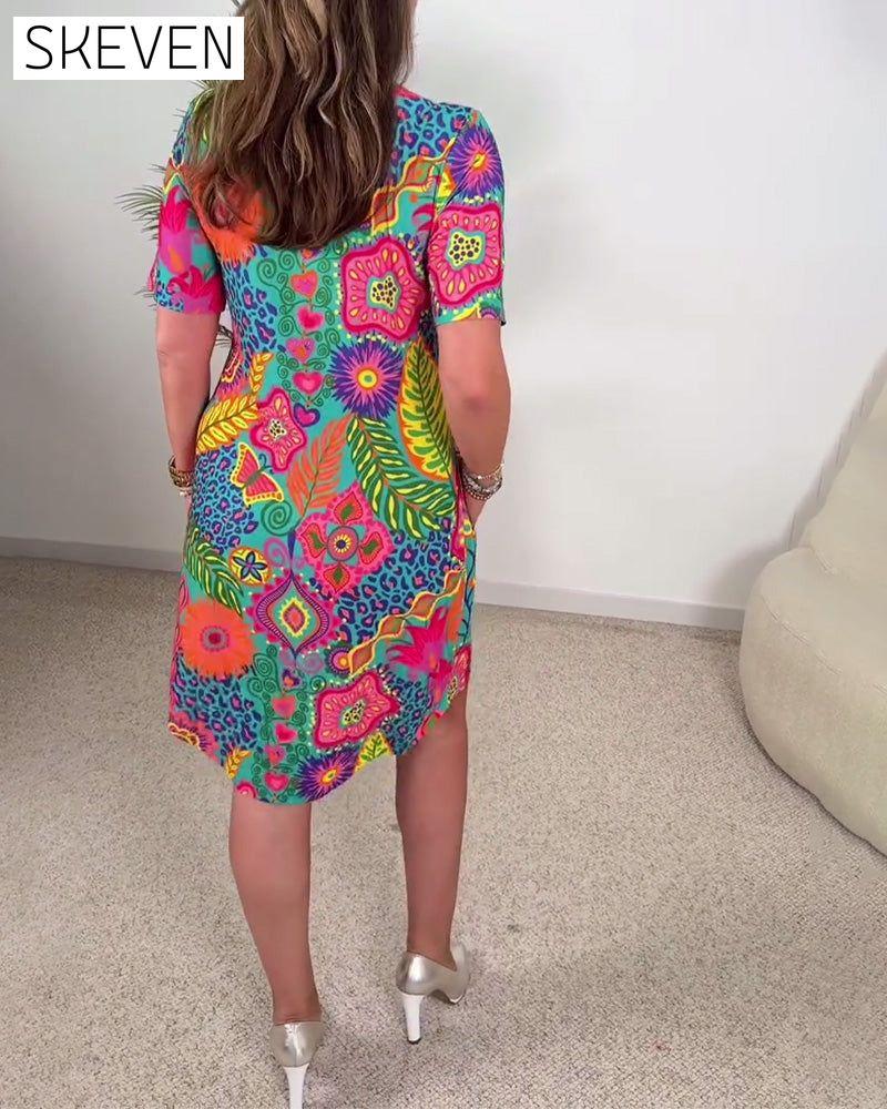 Modisches Kleid mit kurzen Ärmeln und Blumenmuster