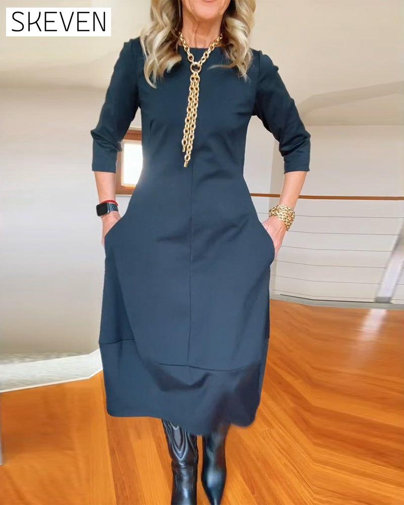 Elegantes, einfarbiges Kleid mit Rundhalsausschnitt und Taschen