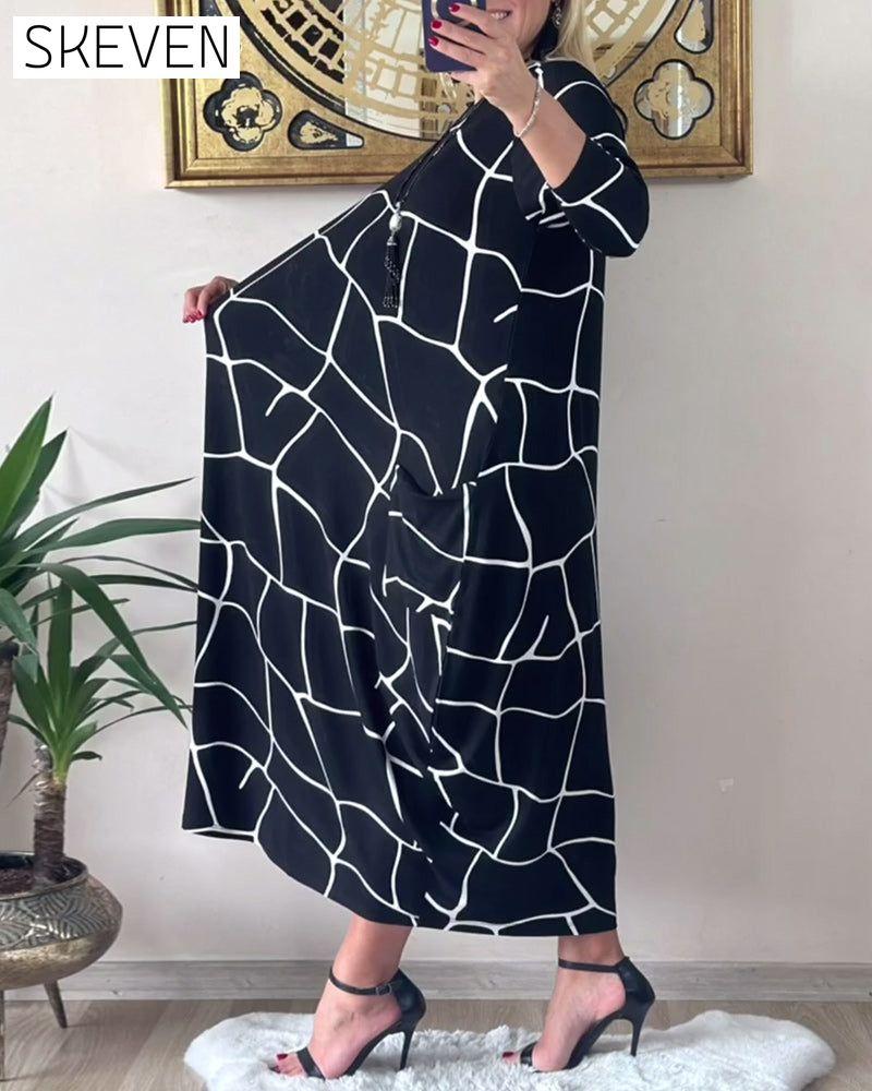 Robe ample à manches longues et col rond avec poches
