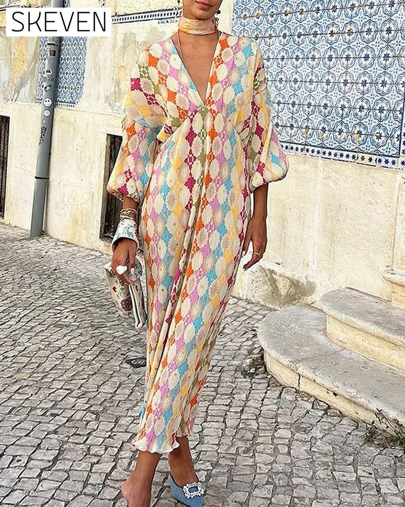 Elegantes Kleid mit V-Ausschnitt, Laternenärmeln und geometrischem Muster