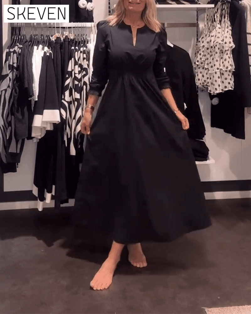 Robe trapèze à manches bouffantes et taille haute