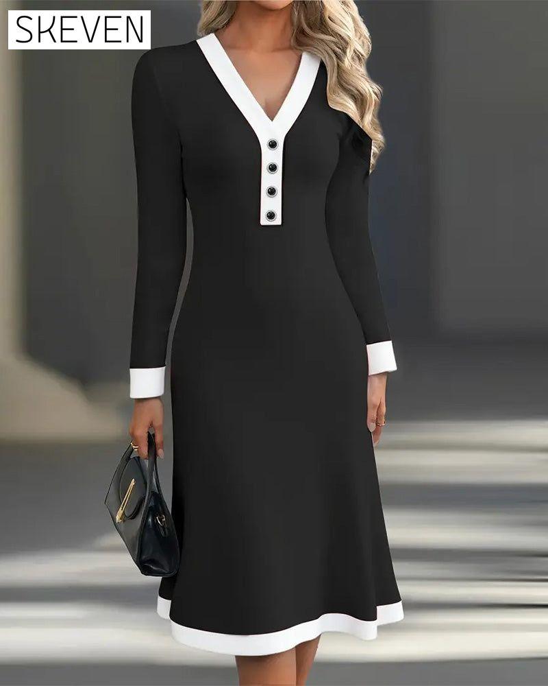 Robe élégante à manches longues et couleurs contrastées