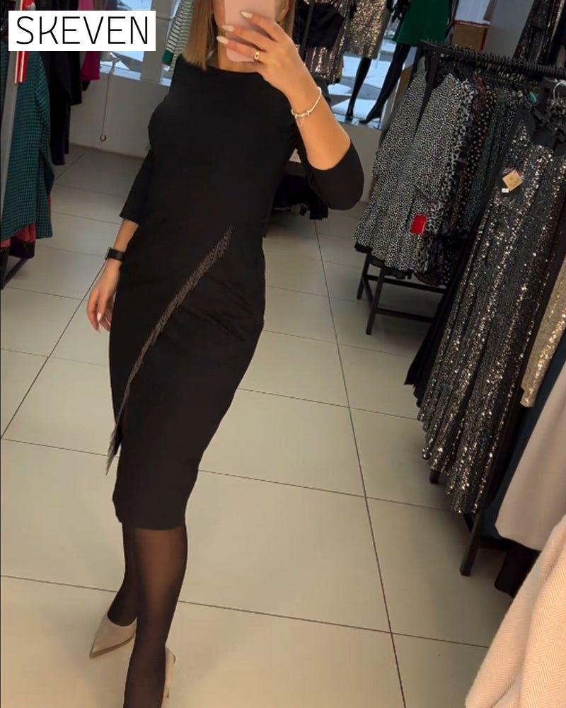 Robe à col rond et fente oblique