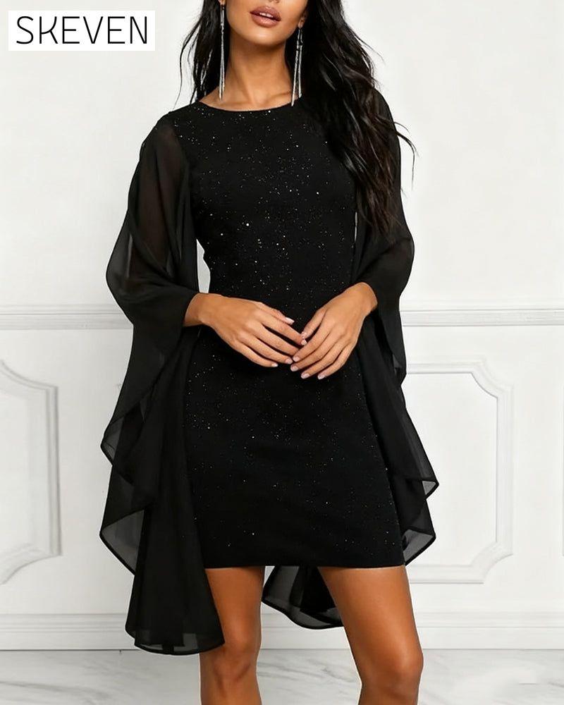 Robe à paillettes, col rond et manches chauve-souris
