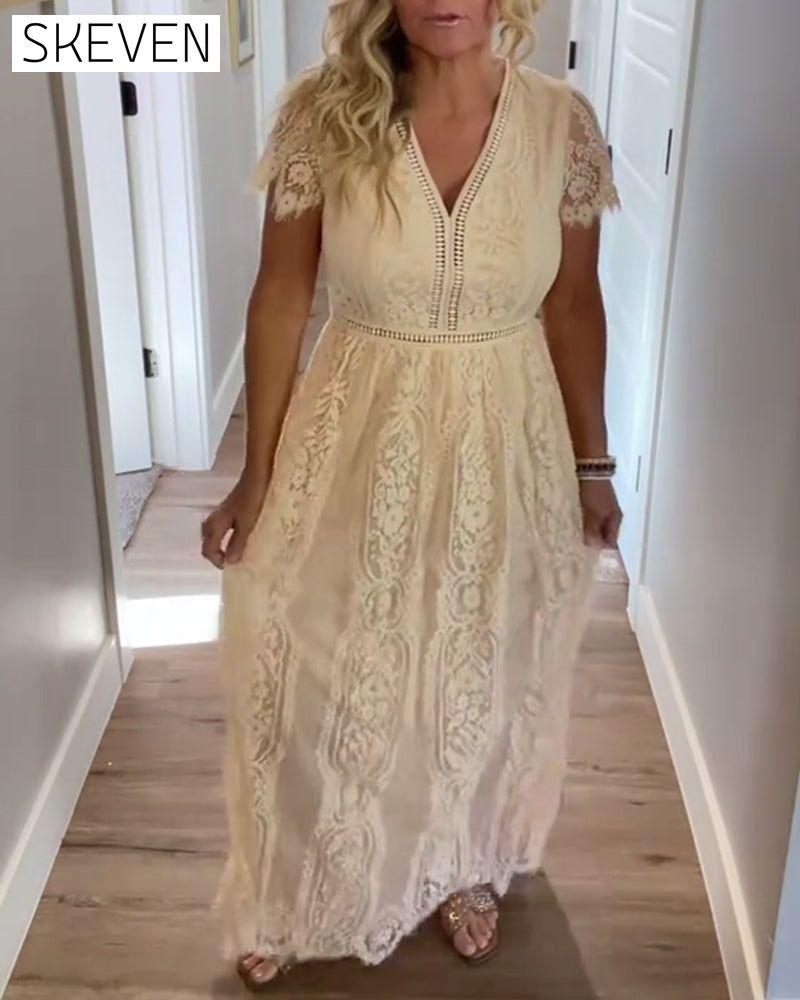 Elegantes Kleid mit V-Ausschnitt und Spitze an der Taille