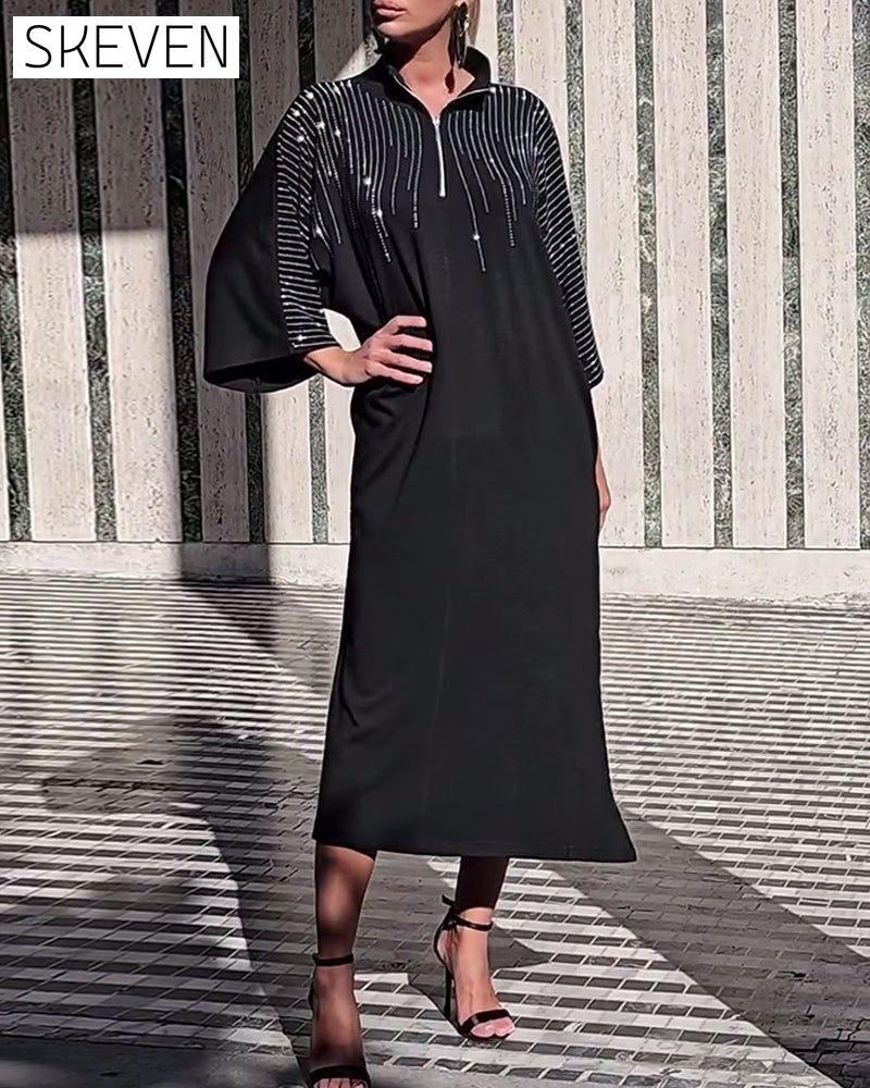 Lässiges Kleid mit Reißverschlusskragen und Schlitz