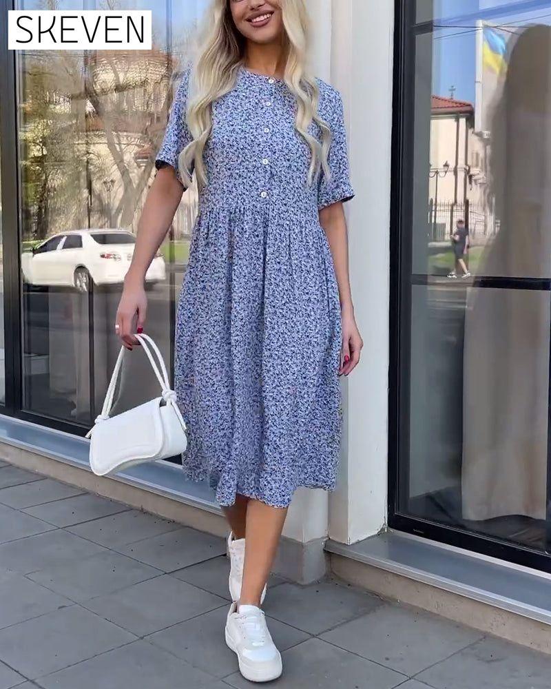 Blumenkleid mit halblangen Ärmeln und Knöpfen