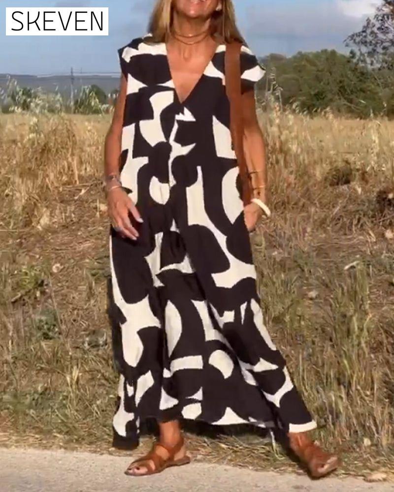 bedrucktes Kleid mit V-Ausschnitt