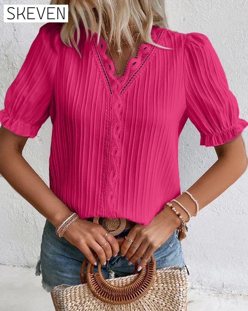 Elegantes Spitzentop mit V-Ausschnitt