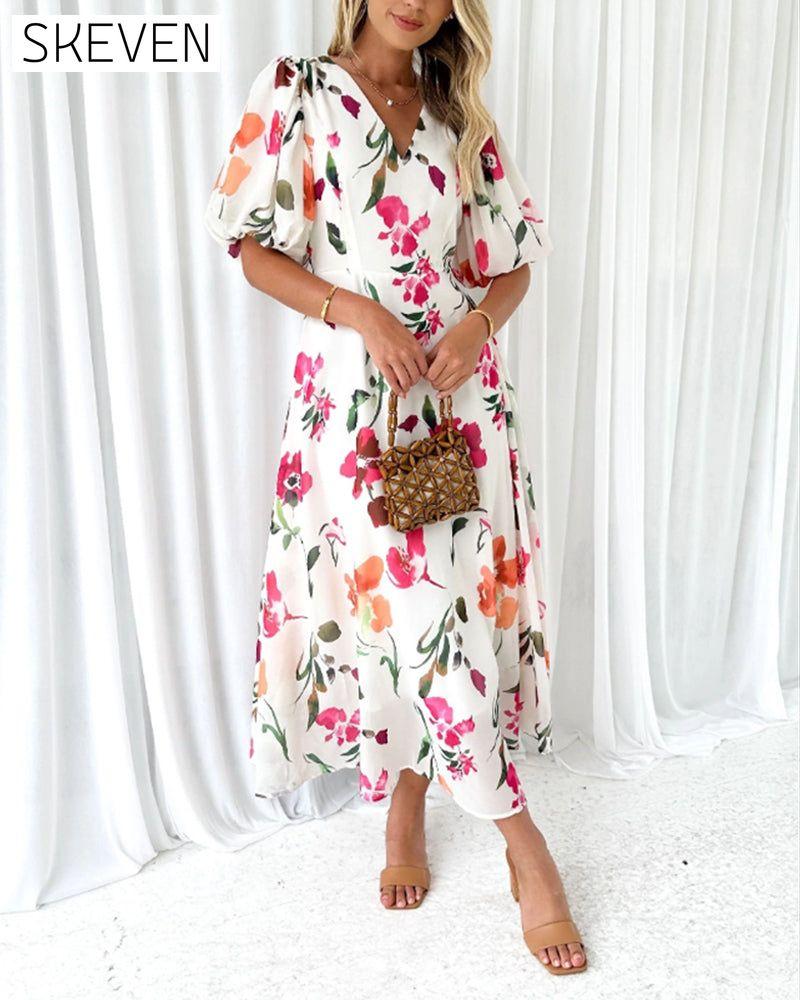 Elegantes Kleid mit Puffärmeln und Blumenmuster