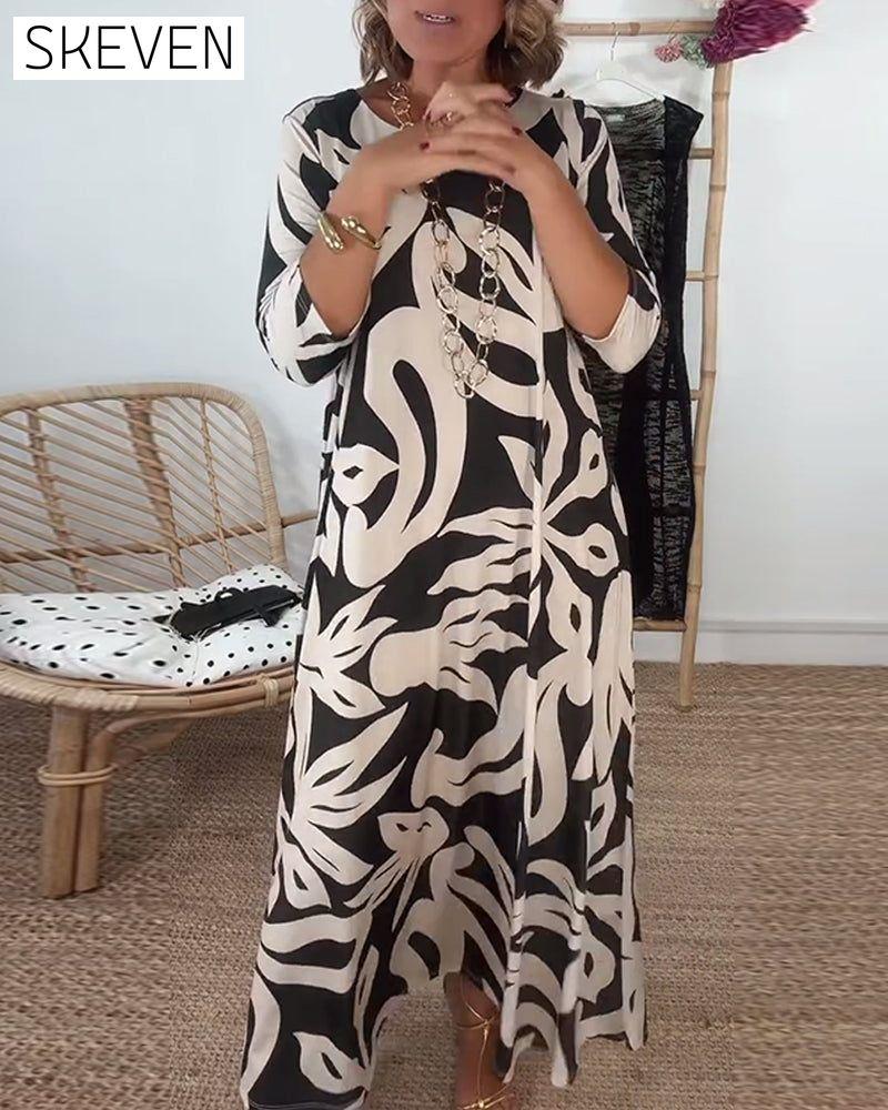 Bedrucktes Kleid mit Rundhalsausschnitt und langen Ärmeln