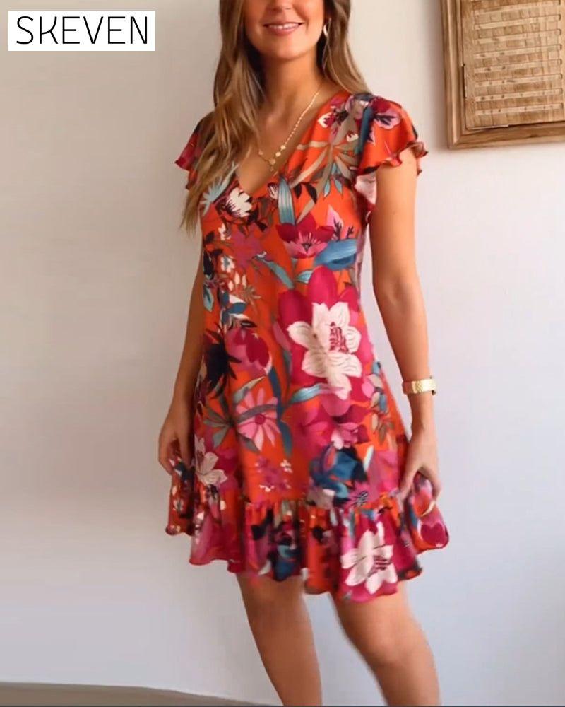 robe fleurie à col en V et à volants