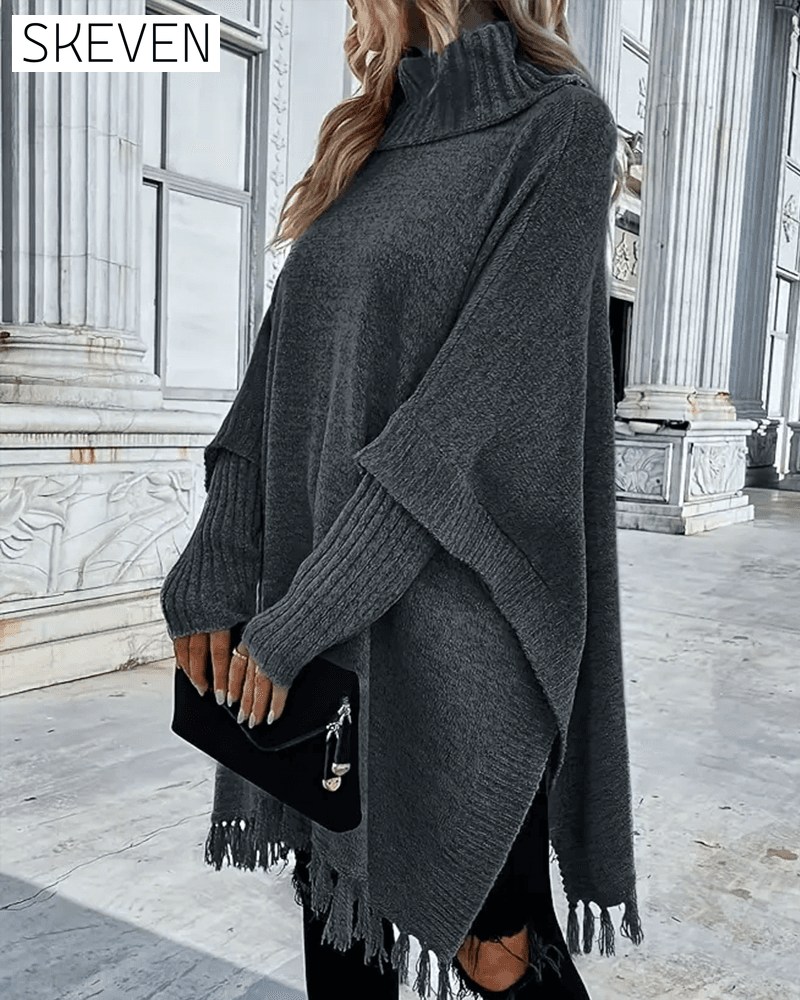 Rollkragenpullover mit Fledermausärmeln und Quasten