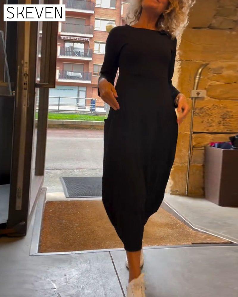 Solid color round neck long sleeve pocket dress