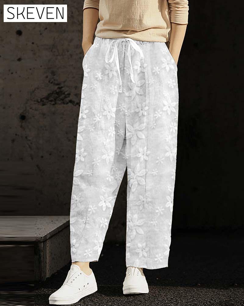 Floral embroidered lace-up solid color casual pants