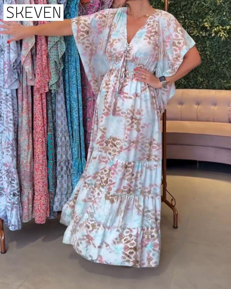 Langes Kleid mit V-Ausschnitt und Schmetterlingsärmeln, bedruckt