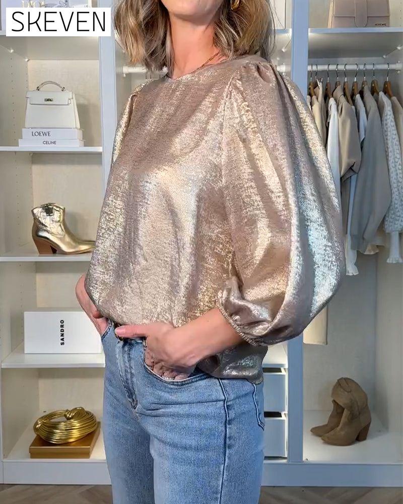 Chemisier tendance à manches bouffantes et col rond
