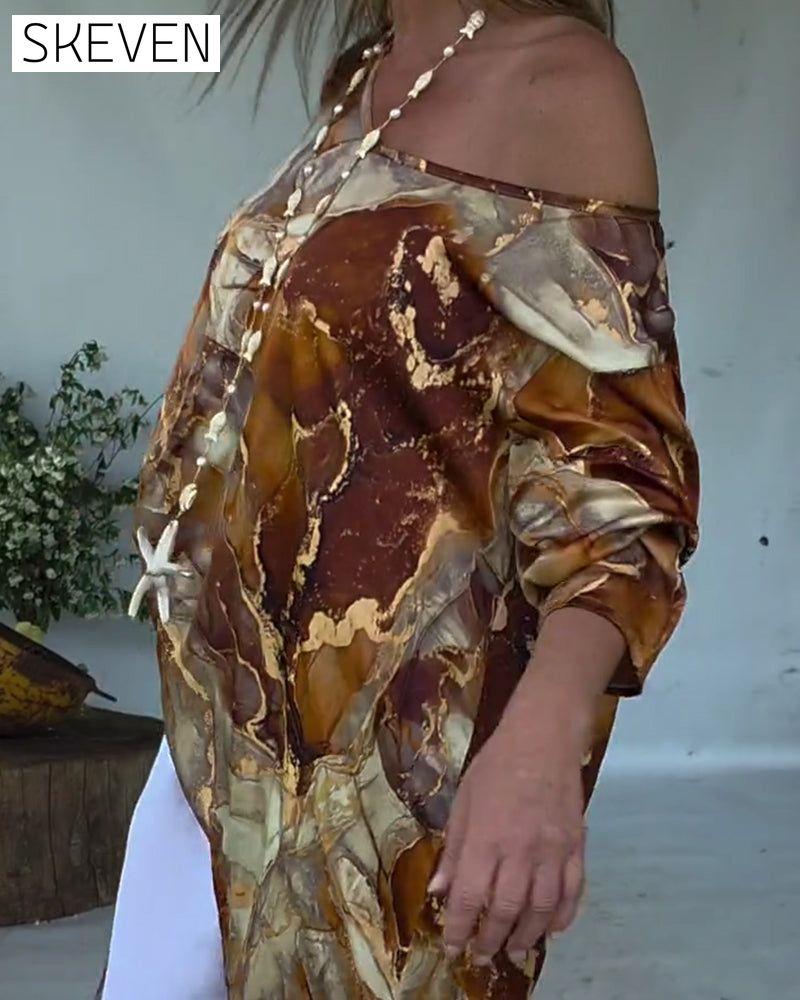 Modische Bluse mit Schlitz und Print
