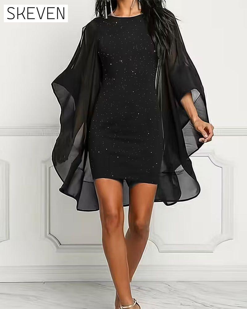 Robe à paillettes, col rond et manches chauve-souris