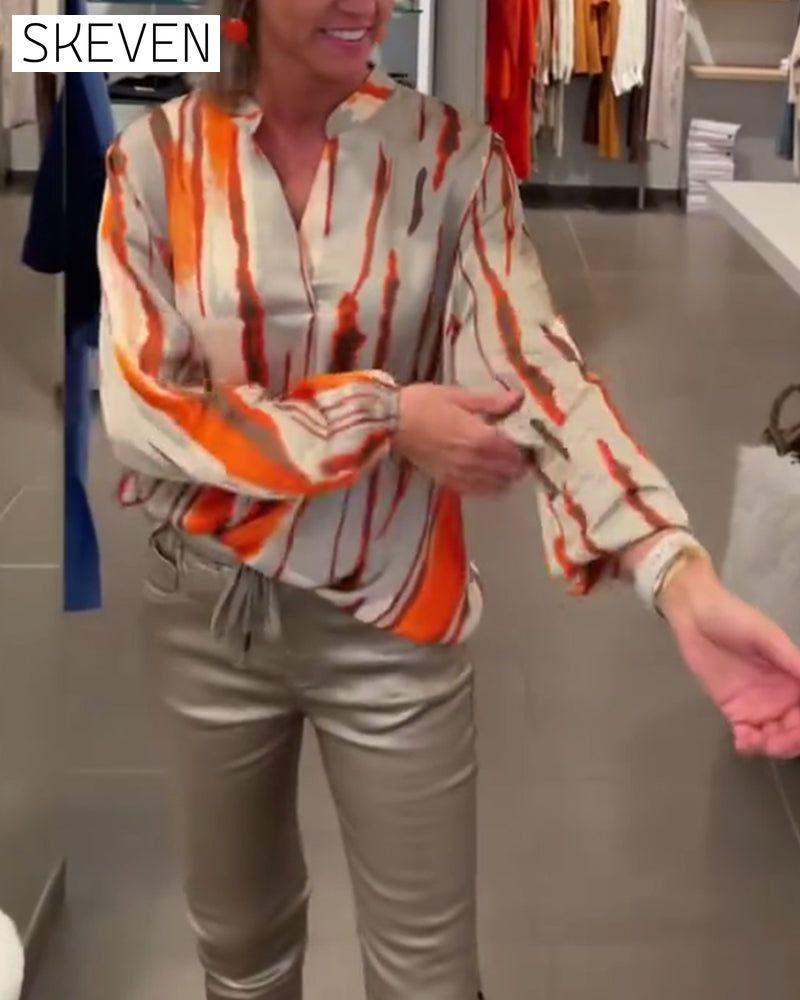 Long sleeve striped print blouse