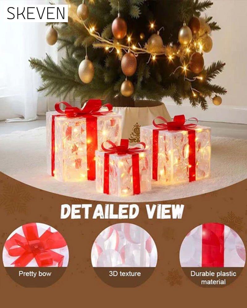 Weihnachtsdekorationen in Form von leuchtenden Geschenkboxen
