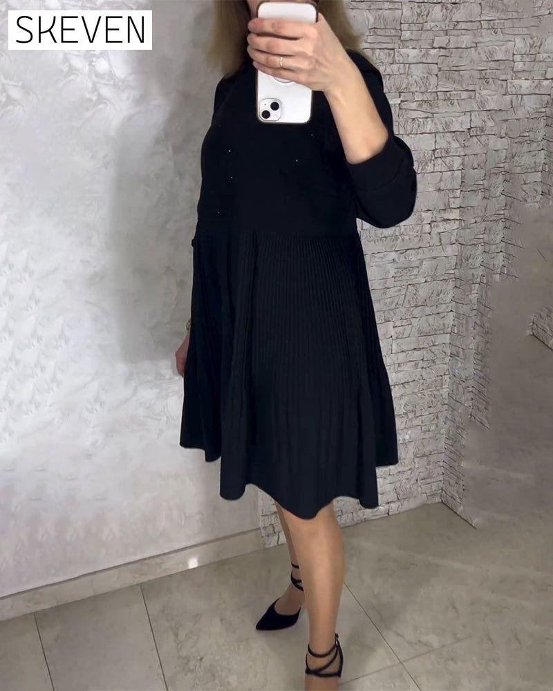 robe plissée unie à col montant