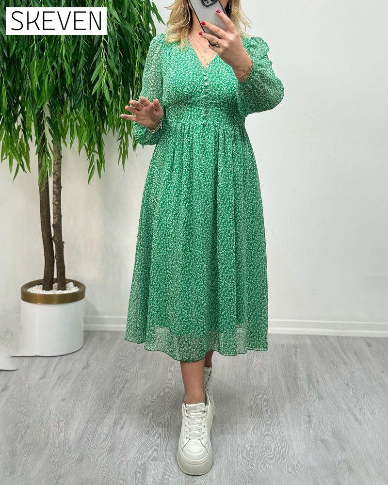 Elegantes Kleid mit Print und Knöpfen