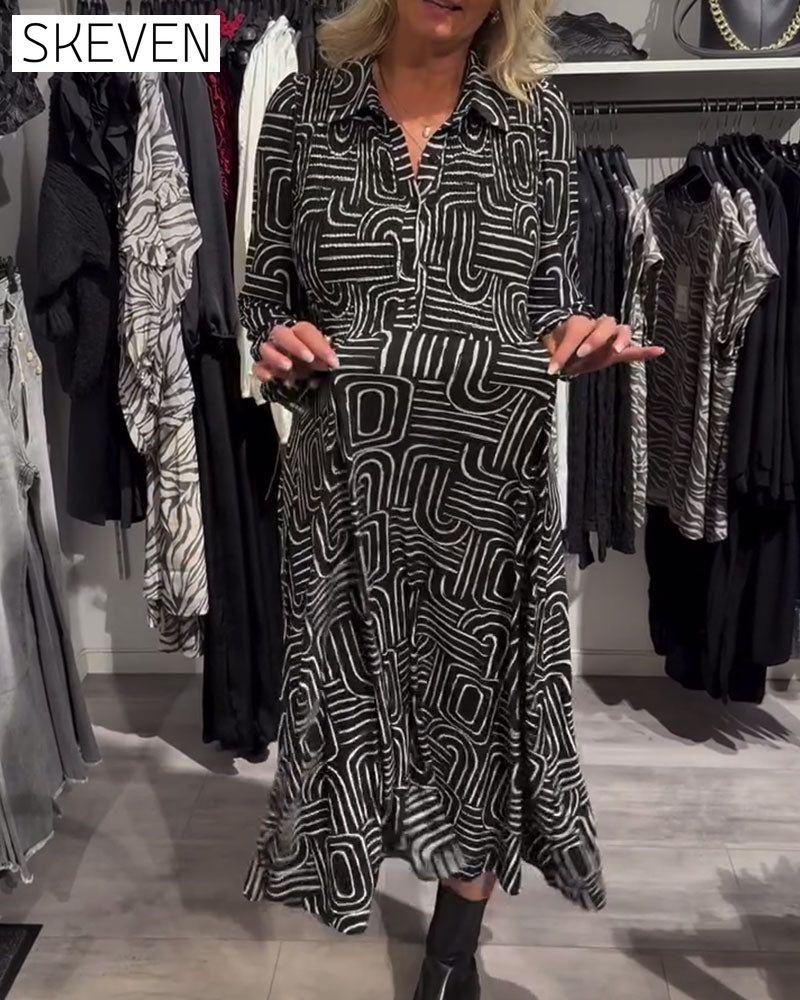 Modisches, bedrucktes Kleid mit Reverskragen