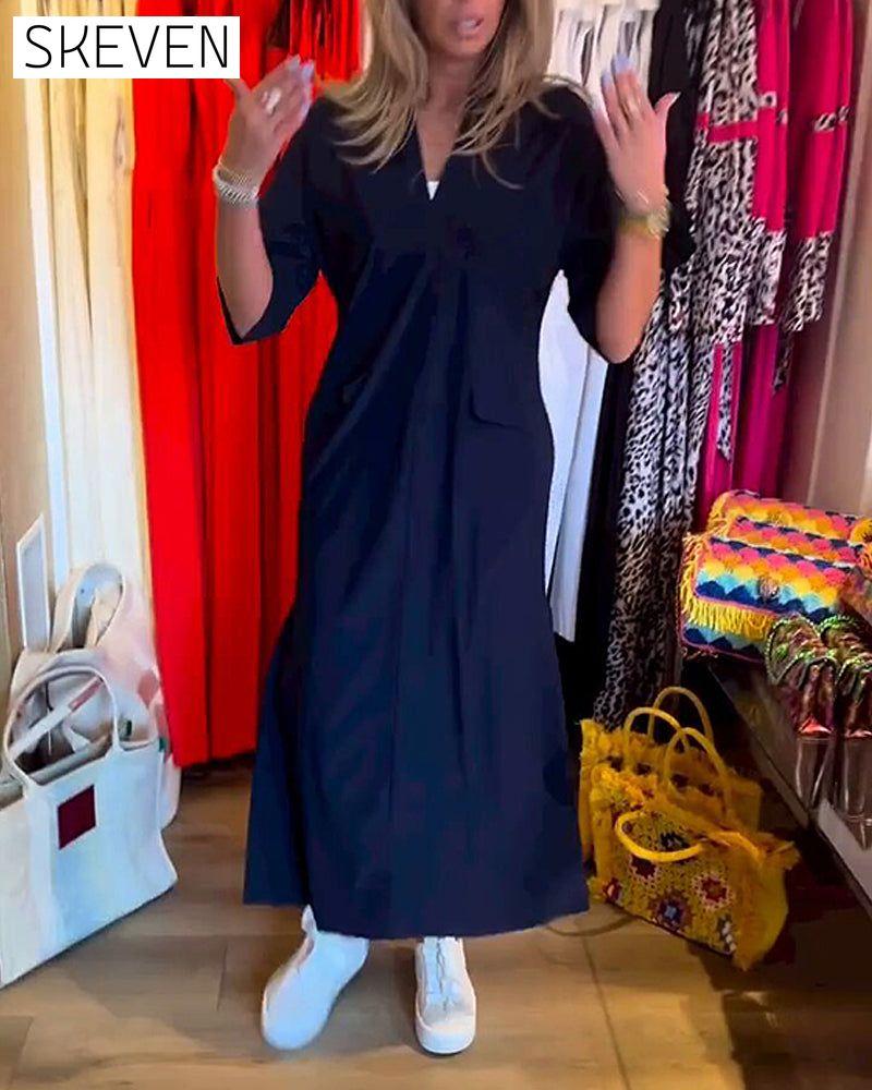Kleid mit V-Ausschnitt und Taschen