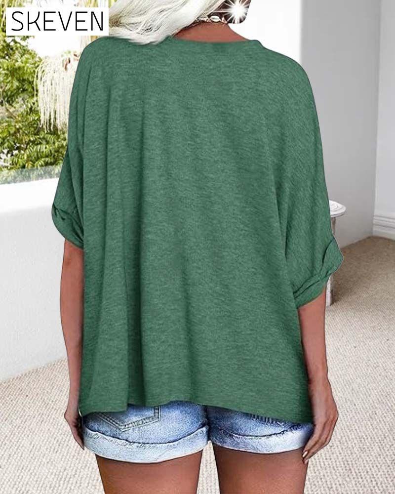 T-shirt ample à manches courtes et col en V et ourlet roulé
