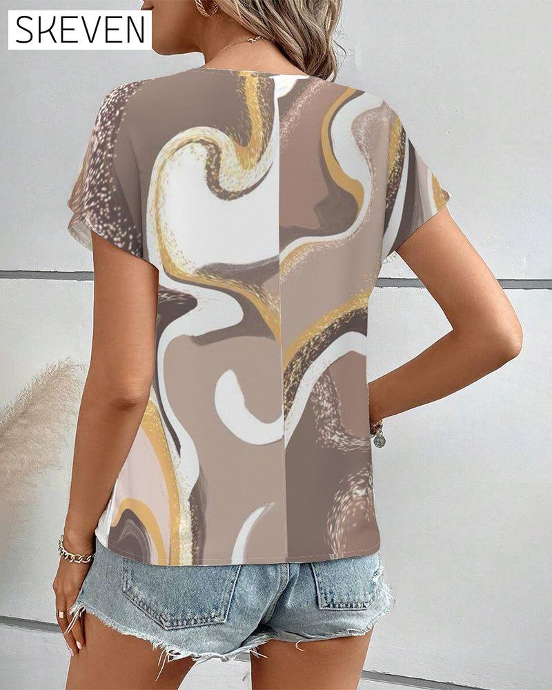 Kurzärmelige Bluse mit geometrischem Muster