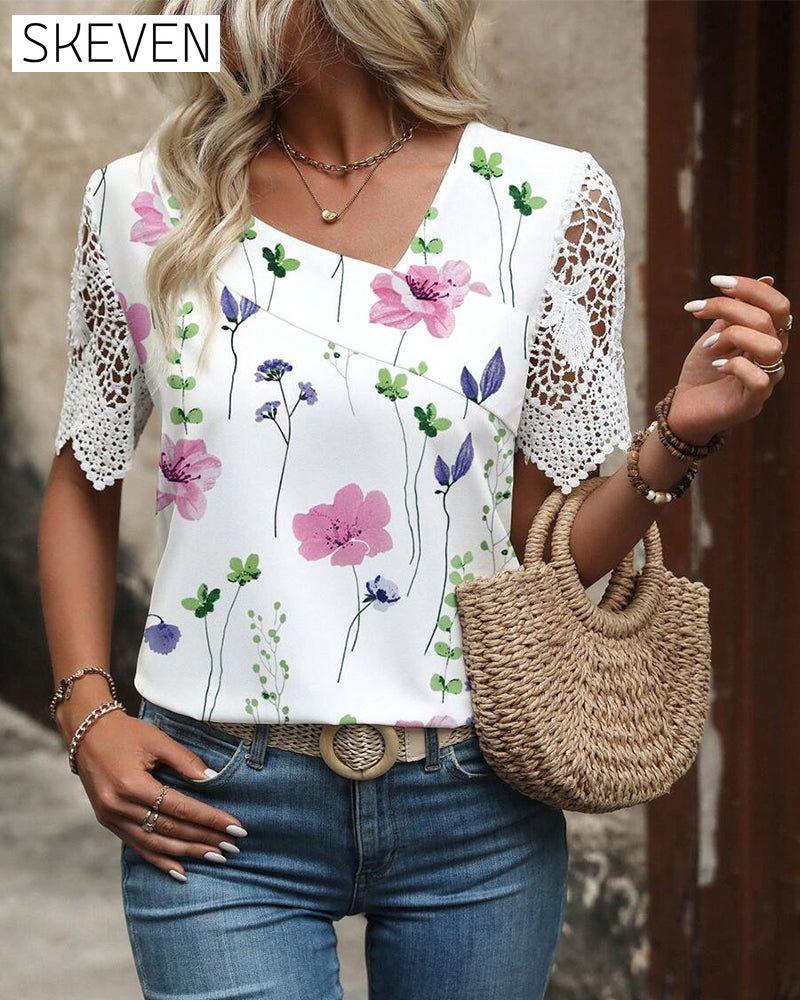 Bedruckte Bluse mit Spitzenbesatz