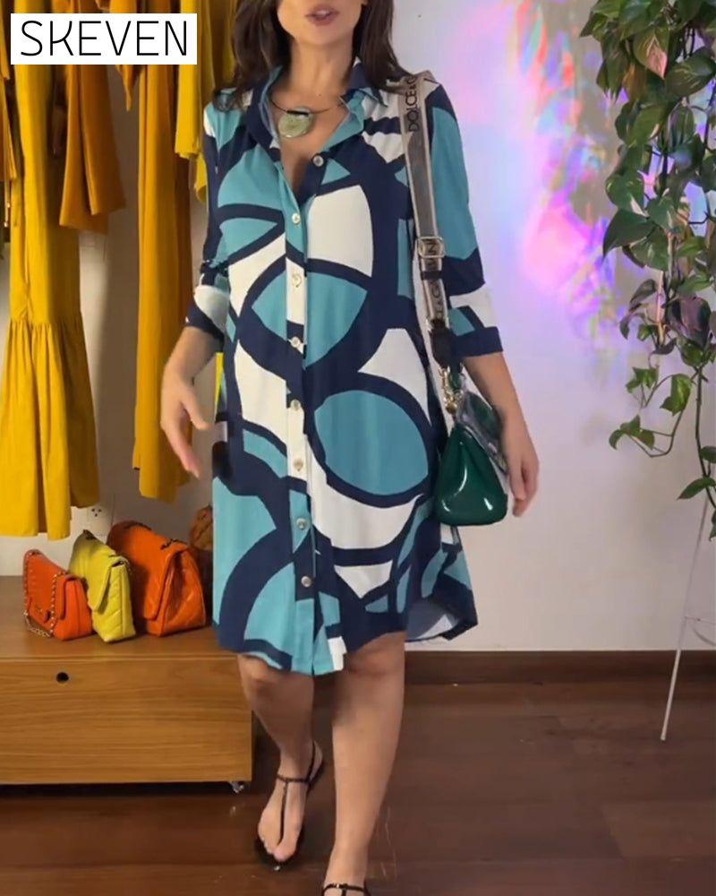 Long-sleeved buttoned printed dress