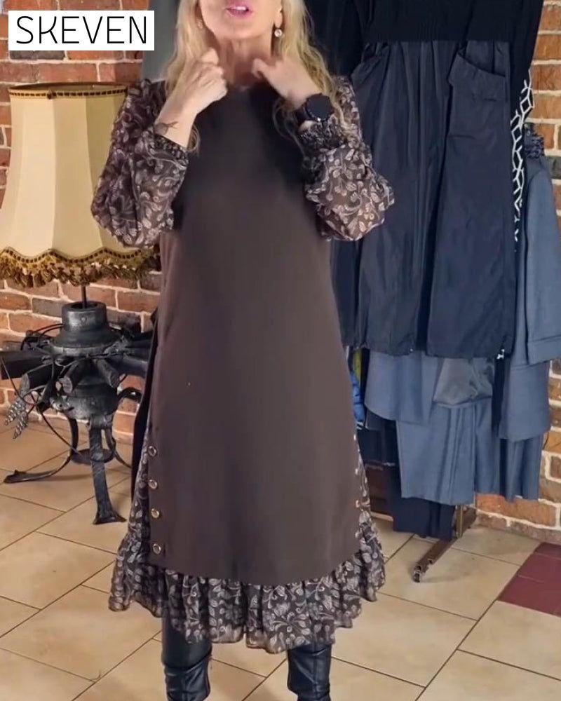 Kleid mit Rundhalsausschnitt und angedeutetem Zweiteiler