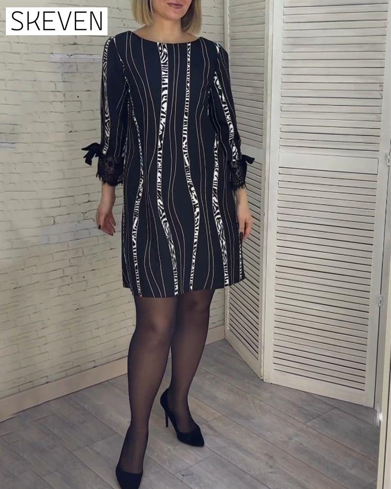 Knee-length striped dress