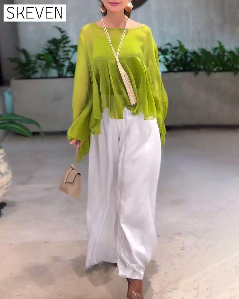 Modische Bluse in Unifarben mit schwungvollem Design