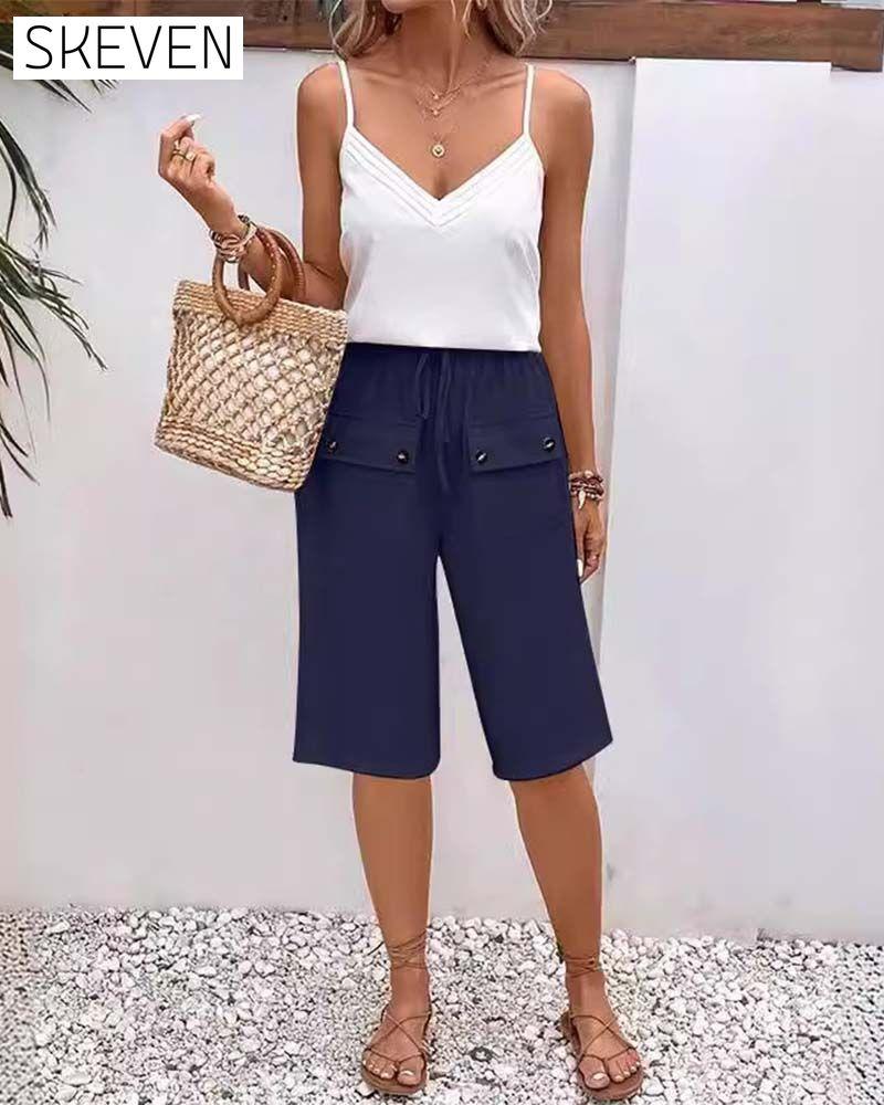 Casual solid color pocket half length trousers