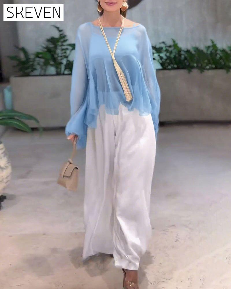 Modische Bluse in Unifarben mit schwungvollem Design