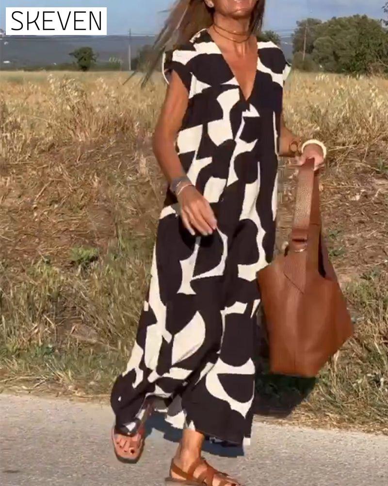bedrucktes Kleid mit V-Ausschnitt