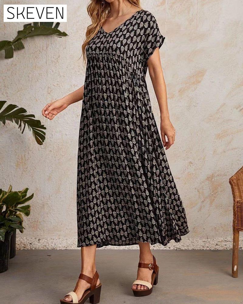 Langes Kleid mit V-Ausschnitt und kurzen Ärmeln