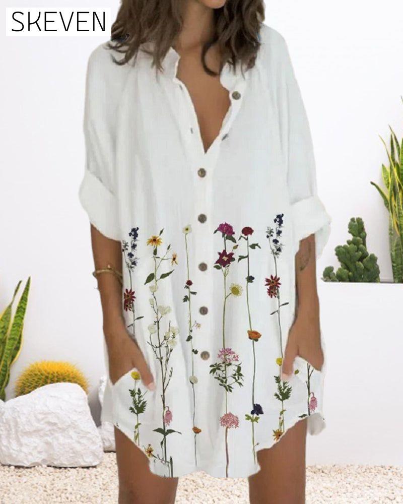 Bedrucktes Kleid mit Knöpfen, langen Ärmeln und Taschen