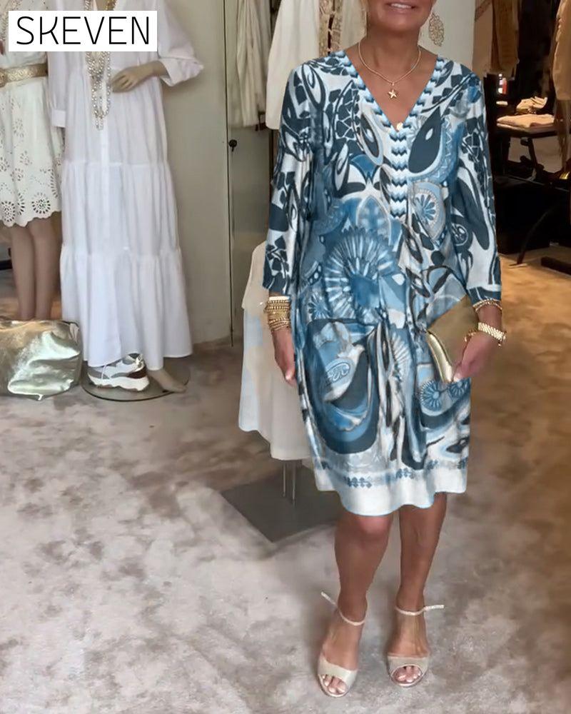 Lässiges Kleid mit Retro-Print und V-Ausschnitt