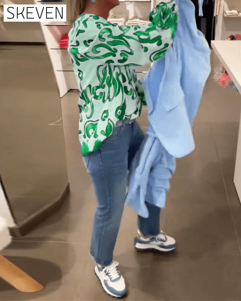 Elegant long-sleeved top with printed V-neck