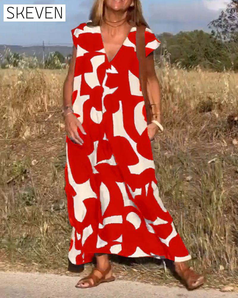 bedrucktes Kleid mit V-Ausschnitt